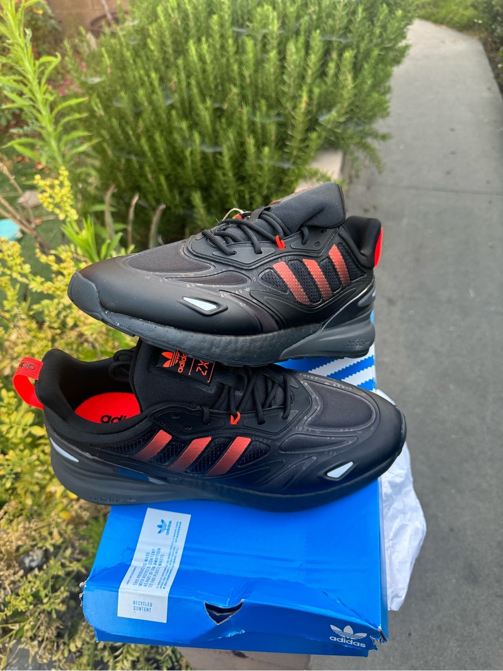 adidas Black Sneakers with Red Accents and Reflective Details